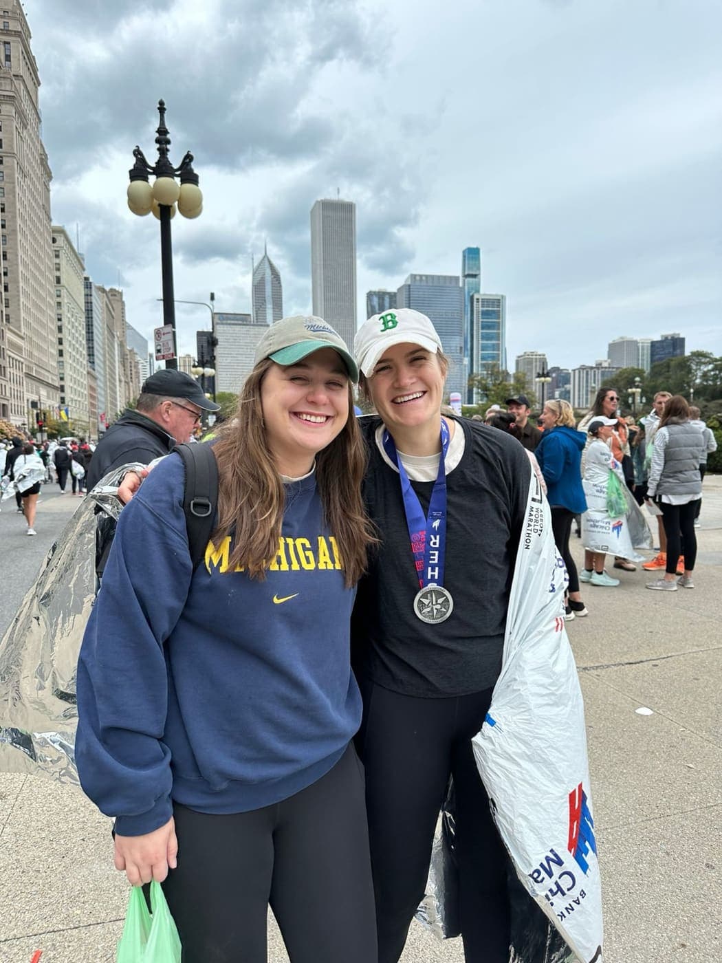 The two of us in Chicago after the marathon, one wearing a finisher’s medal